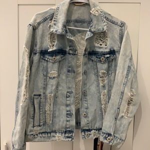 Distressed light denim jacket size small
